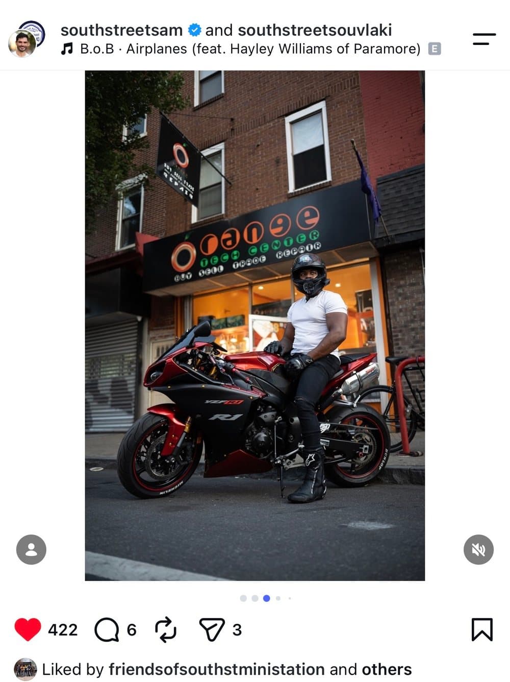 Community rides in front of Orange Tech