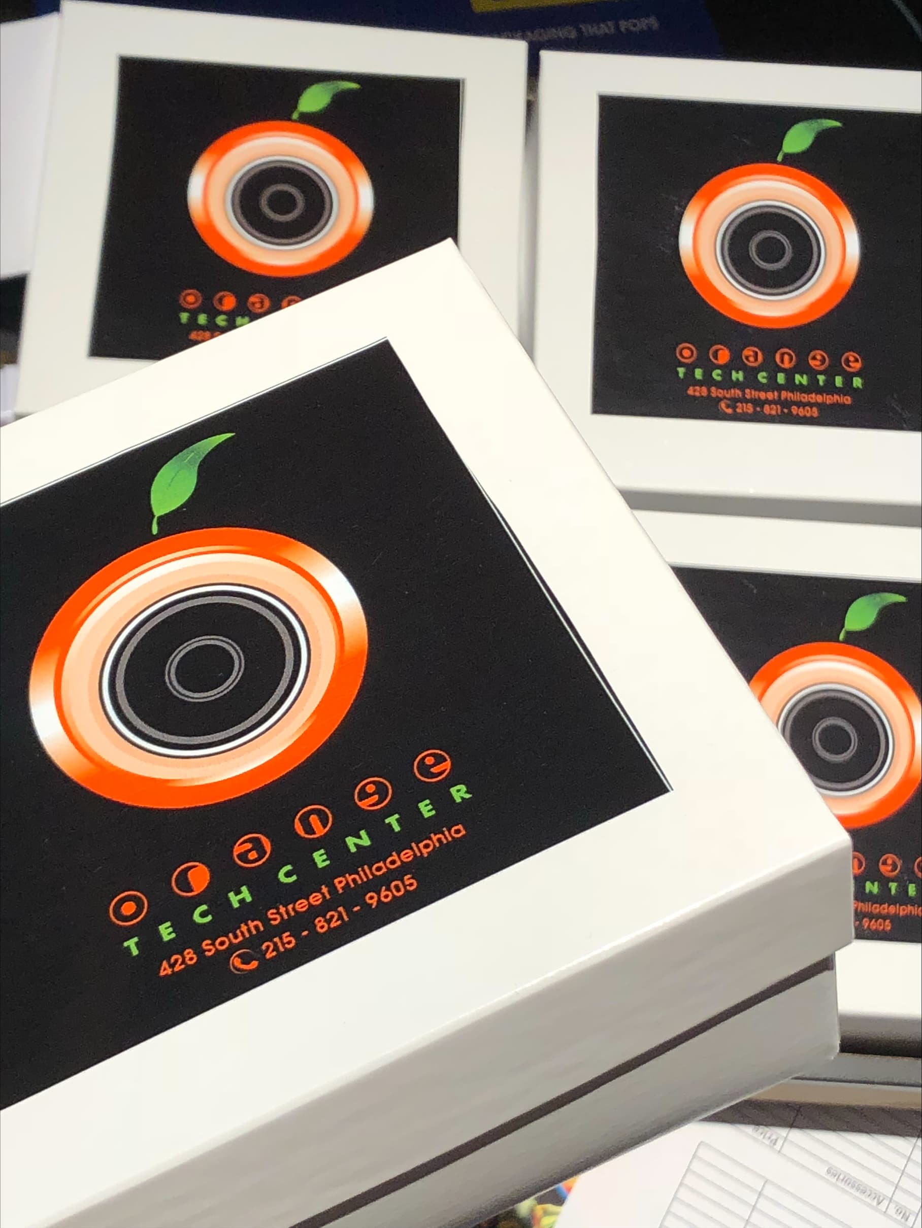 Orange Tech Center boxed product display — item photo pending verification